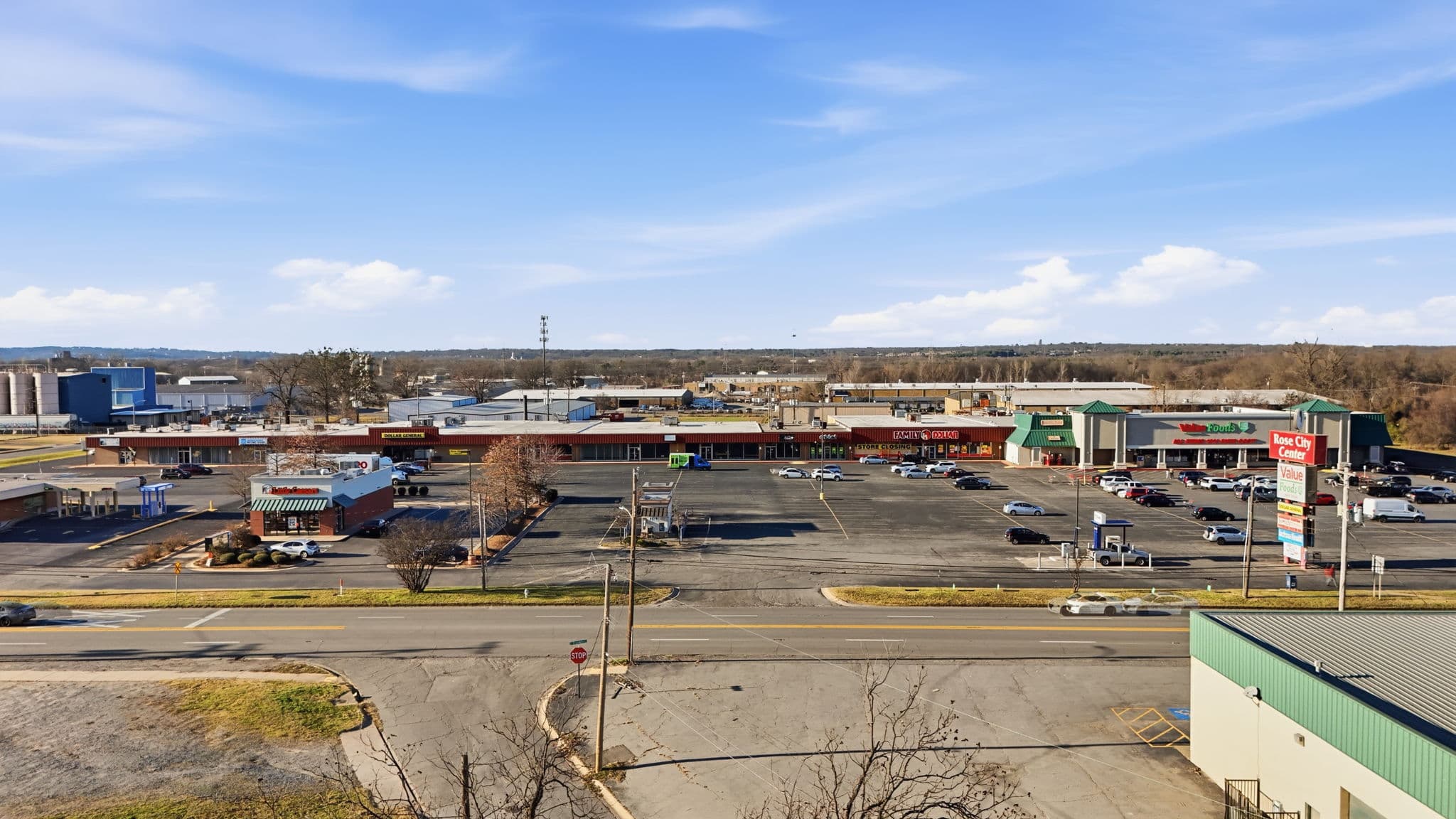 Aerial photo of a retail strip center and its parking field in North Little Rock, Arkansas